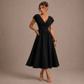 Vestido elegante con mangas de murciélago y cuello en V